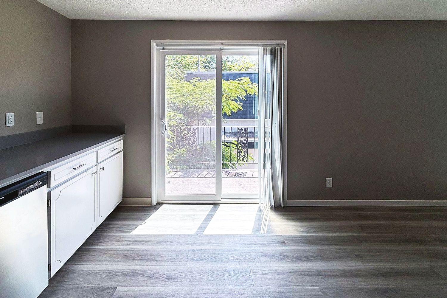 Dining area with a sliding door to the balcony